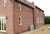 Old large farmhouse or just very good brick match on the extension?? 3
