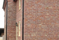 Old large farmhouse or just very good brick match on the extension?? 4