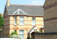 Old buildings in background reflected in the new build in foreground & on previous photo