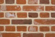 11003