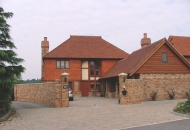 Tailored solutions incorporating tile hanging with plain tiled roofs